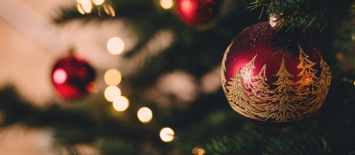 Red baubles on a traditional Christmas tree