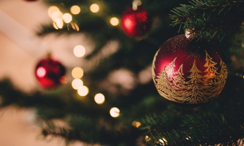 Red baubles on a traditional Christmas tree